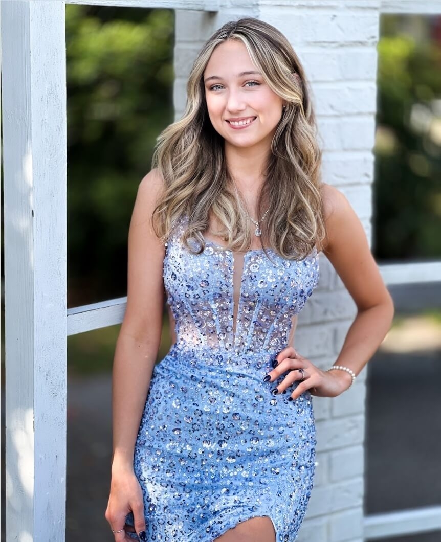 Model wearing a blue dress